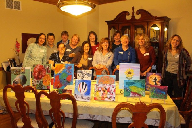 Here's a happy group of new friends with their unique masterpieces.